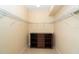 Spacious walk-in closet with shelving and a built-in dresser at 267 Talquin Ct, Englewood, FL 34223