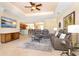 Open-concept living room featuring recessed lighting and easy access to the kitchen at 267 Talquin Ct, Englewood, FL 34223
