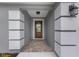 Welcoming entryway with a decorative glass door and tiled floor at 271 Antis Dr, Rotonda West, FL 33947