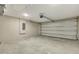 Spacious garage with an automatic door opener and ample space for vehicles and storage at 271 Antis Dr, Rotonda West, FL 33947