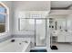 Bright bathroom with a tub and separate shower with glass door at 285 Spaniards Rd, Placida, FL 33946