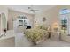 Inviting bedroom with plenty of natural light, a ceiling fan, and ample closet space at 285 Spaniards Rd, Placida, FL 33946