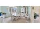Light-filled dining room with neutral color palette and large window at 285 Spaniards Rd, Placida, FL 33946