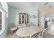 Dining room features stylish furniture and flows into a well-equipped kitchen at 285 Spaniards Rd, Placida, FL 33946