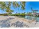 Waterfront property featuring a private dock with boat lifts, offering convenient access to the water at 285 Spaniards Rd, Placida, FL 33946