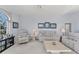 Comfortable living room with neutral tones and natural light at 285 Spaniards Rd, Placida, FL 33946