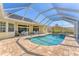Spacious screened-in pool and patio area, perfect for entertaining and relaxation at 285 Spaniards Rd, Placida, FL 33946