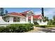 Charming single-Gathering home with a red tile roof and manicured front yard at 365 Capstan Dr, Placida, FL 33946