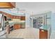 Modern kitchen featuring stainless appliances and access to a screened lanai at 365 Capstan Dr, Placida, FL 33946