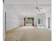 Expansive living room with high ceilings, arched windows, and elegant lighting fixtures, ready for personal touches at 365 Capstan Dr, Placida, FL 33946