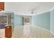Bright living area features tile flooring with access to the screened lanai and pool at 365 Capstan Dr, Placida, FL 33946