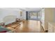 Spacious main bedroom with hardwood floors and a sliding glass door at 365 Capstan Dr, Placida, FL 33946