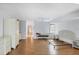 Large primary bedroom with hardwood floors, ceiling fan, and bright natural light at 365 Capstan Dr, Placida, FL 33946