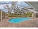 Inviting screened-in pool area with comfortable lounge chairs, perfect for relaxing and enjoying the outdoors at 365 Capstan Dr, Placida, FL 33946
