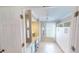 Bright office space with built-in desk, cabinets, a window, and neutral decor at 399 Blue Springs Ct # 203, Englewood, FL 34223