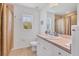Bright bathroom featuring a modern vanity, clean toilet, and neutral colors for a welcoming feel at 423 Boundary Blvd, Rotonda West, FL 33947
