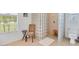 Tiled bathroom features a glass block shower, tiled floors and a window at 423 Boundary Blvd, Rotonda West, FL 33947