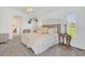 Comfortable bedroom featuring neutral décor, plush carpet, and natural light at 423 Boundary Blvd, Rotonda West, FL 33947