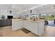 Kitchen area showcases a breakfast bar with an open view to the living room at 423 Boundary Blvd, Rotonda West, FL 33947