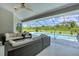 Inviting pool area with ample seating, a screened enclosure, and lush landscaping for privacy at 423 Boundary Blvd, Rotonda West, FL 33947
