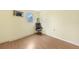 This empty bedroom offers laminate flooring and a single window for natural lighting at 4371 Tollefson Ave, North Port, FL 34287
