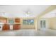 Bright and airy kitchen, open layout, with view to the backyard and ample natural light at 4371 Tollefson Ave, North Port, FL 34287