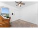 Bedroom showcasing a desk and good natural lighting at 4399 Mundella Cir, Port Charlotte, FL 33948