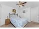 Bedroom featuring carpet floors, a ceiling fan, and furniture at 4399 Mundella Cir, Port Charlotte, FL 33948