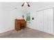 Bedroom featuring a desk, closet space, and a window for natural lighting at 4399 Mundella Cir, Port Charlotte, FL 33948
