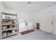 Functional laundry room with shelving, washer, dryer, and ample storage space at 4399 Mundella Cir, Port Charlotte, FL 33948