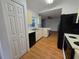 Kitchen features modern appliances, including dishwasher and plenty of cabinet storage at 4900 Hurley Ave, North Port, FL 34288