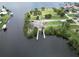 Waterfront property showcasing a boat ramp, providing access to the water for boating and recreational activities at 5412 Ulysses St, Port Charlotte, FL 33981