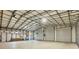 Massive garage has three bays for cars or equipment, plus storage and room to work at 5412 Ulysses St, Port Charlotte, FL 33981
