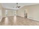 Living room with tile floors, neutral walls, and lots of natural light from the large windows at 5412 Ulysses St, Port Charlotte, FL 33981