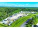 A trailer and RV park community near a wooded area in Florida on a sunny day at 7337 Desant Ln, Port Charlotte, FL 33981
