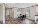 Dining area with a table, chairs, window, and neutral decor at 7337 Desant Ln, Port Charlotte, FL 33981