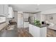 Modern kitchen features stainless steel appliances, an island, and durable countertops at 7337 Desant Ln, Port Charlotte, FL 33981