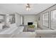 Spacious living room featuring sleek furniture and modern finishes at 7337 Desant Ln, Port Charlotte, FL 33981