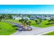 Well-maintained community with neat homes, lush landscaping, and easy road access at 7337 Desant Ln, Port Charlotte, FL 33981