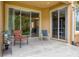 Enclosed patio offering an outdoor seating area and view of backyard at 8228 Villa Grande Ct, Sarasota, FL 34243