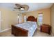 Bright bedroom with tile flooring, ceiling fan and natural light at 9325 Crugar Ter, Englewood, FL 34224