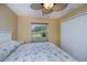 Bedroom with large window and closet at 9325 Crugar Ter, Englewood, FL 34224