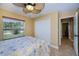 Bedroom with closet and entrance to another room at 9325 Crugar Ter, Englewood, FL 34224