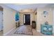 Inviting home entryway featuring tile floors and decorative accents at 9325 Crugar Ter, Englewood, FL 34224