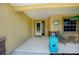 Welcoming front porch with seating and charming decor near the entrance at 9325 Crugar Ter, Englewood, FL 34224