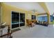 Enjoyable covered lanai area provides ample room for seating and entertaining at 9325 Crugar Ter, Englewood, FL 34224