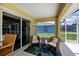Inviting covered lanai area perfect for relaxing and enjoying the outdoors at 9325 Crugar Ter, Englewood, FL 34224