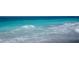 Captivating view of the ocean with soothing waves and shades of blue water at 9325 Crugar Ter, Englewood, FL 34224