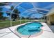 Lovely screened-in pool with pristine blue water perfect for leisurely swims and relaxation in privacy at 9325 Crugar Ter, Englewood, FL 34224