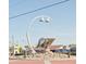 Whimsical public art featuring a nautilus shell in the middle of a roundabout at 9325 Crugar Ter, Englewood, FL 34224